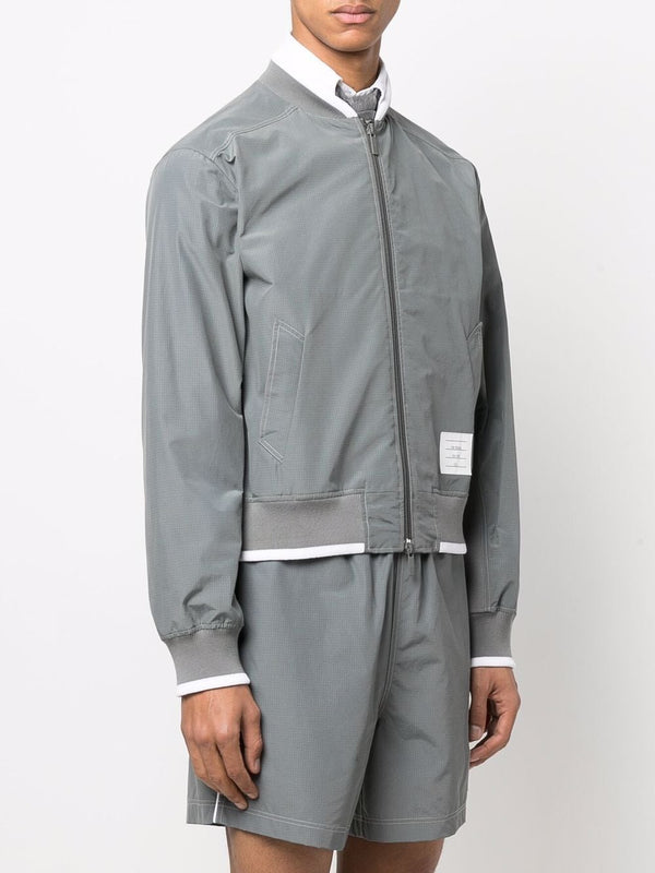 THOM BROWNE MEN BOMBER W/ CONTRAST WHITE STITCHING IN RIPSTOP