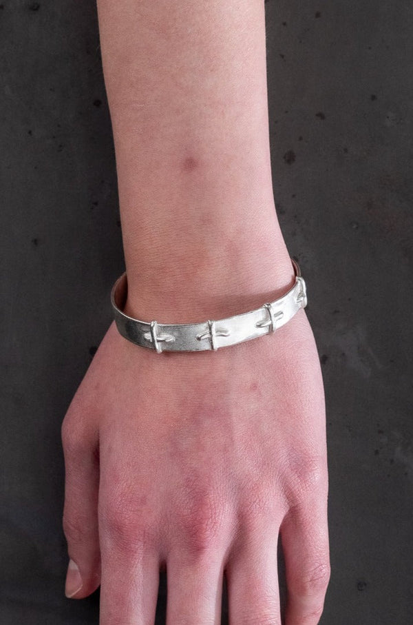 M.A+ Silver Stitched Cross Bracelet