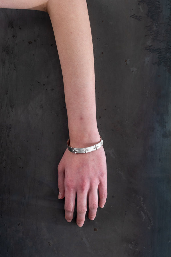 M.A+ Silver Stitched Cross Bracelet