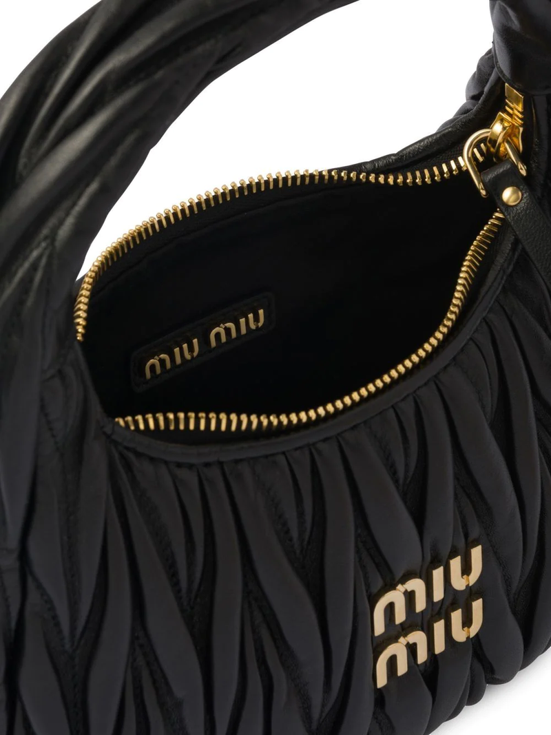 Miu Miu Shows Overstuffed Bowlers, Bucket Bags and More for Spring 2024 -  PurseBlog