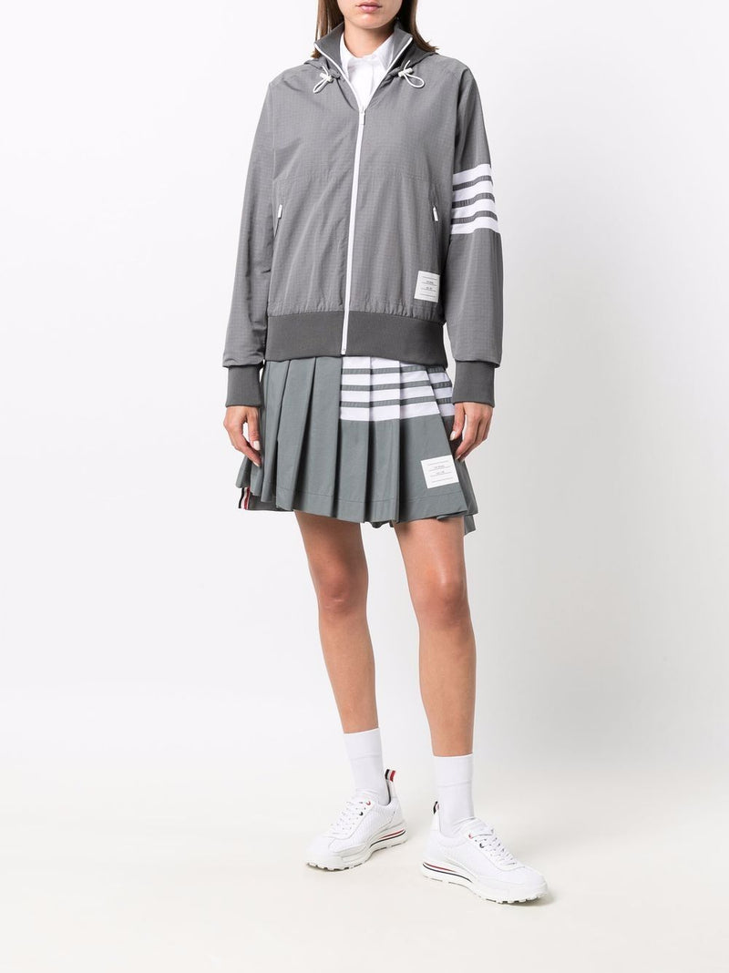 THOM BROWNE WOMEN MINI DROPPED BACK PLEATED SKIRT W/ MESH 4 BAR IN SUSTAINABLE RIPSTOP - NOBLEMARS
