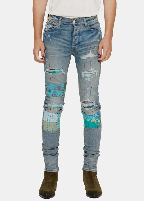 AMIRI Clay Indigo Quilted Artpatch Jeans - NOBLEMARS