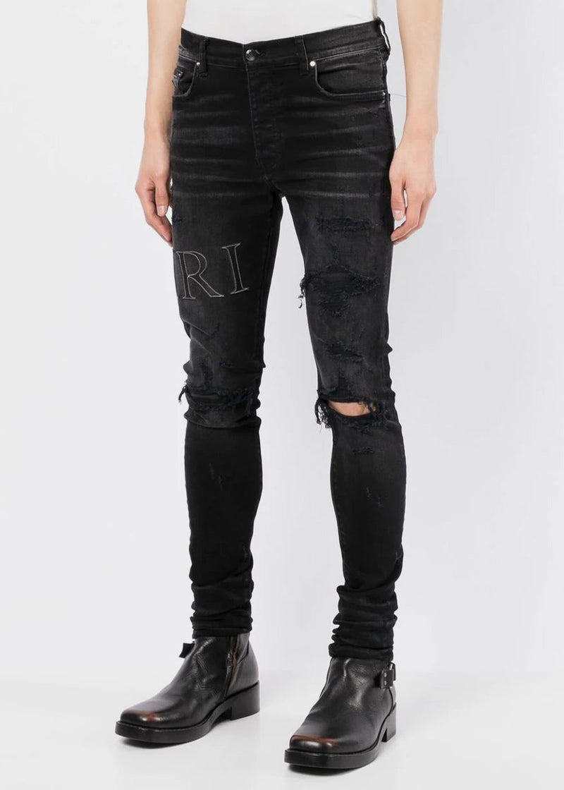 AMIRI Aged Black Leather Stitch Logo Jeans - NOBLEMARS