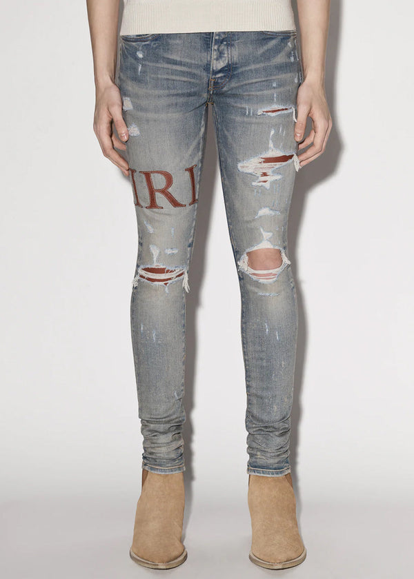 AMIRI Clay Indigo Leather Stitch Logo Jeans - NOBLEMARS
